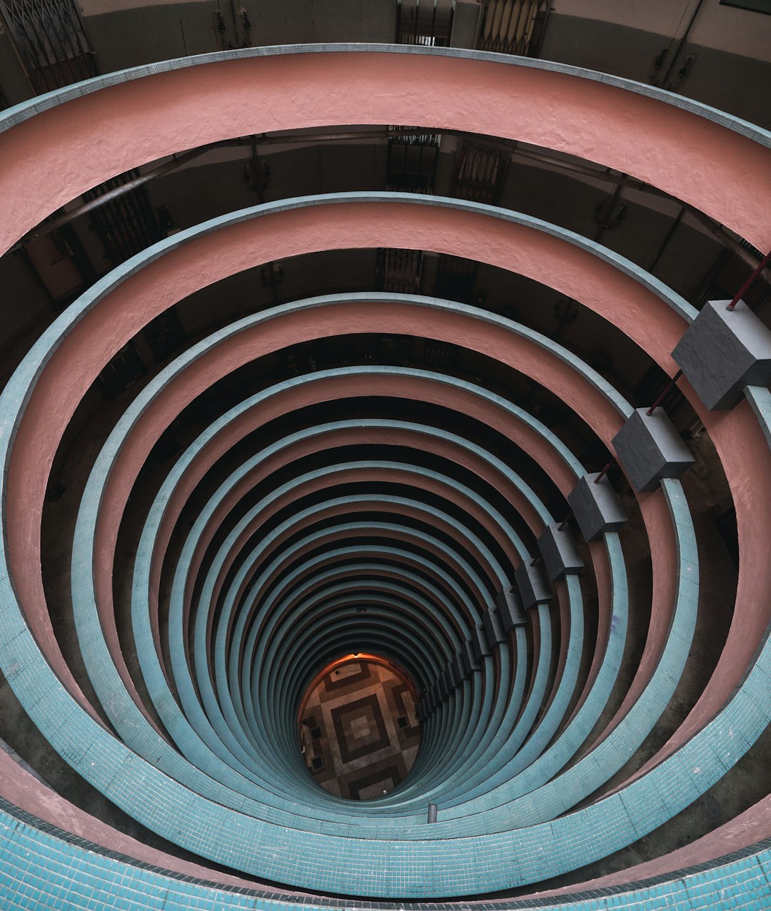 Photo by Sasha Kaunas black and brown spiral staircase